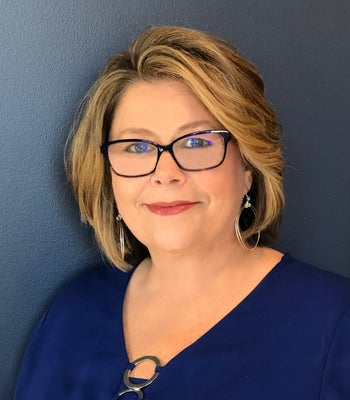 Portrait of Deb Smith, REALTOR®, ABR.